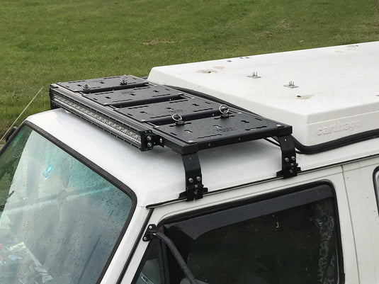 Rolling Space VW T3 Dachträger vor Aufstelldach | SpaceRack modular